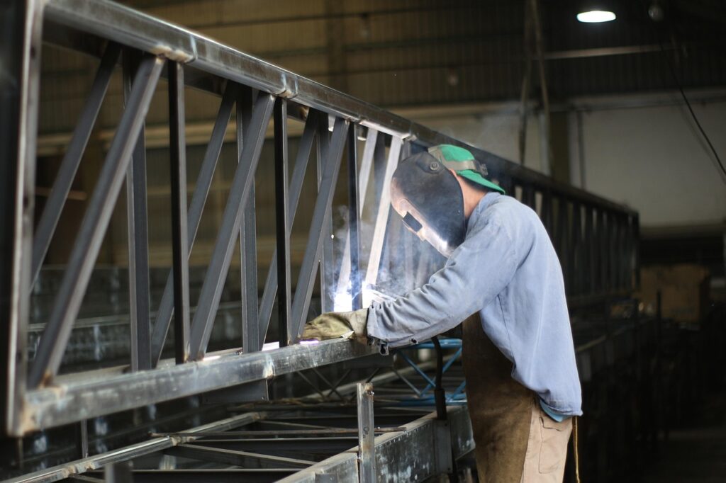 man doing metal welding fabrication GTA
